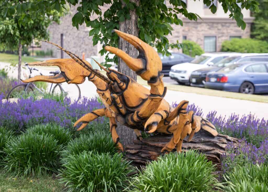 Yellow crawdad sculpture outside