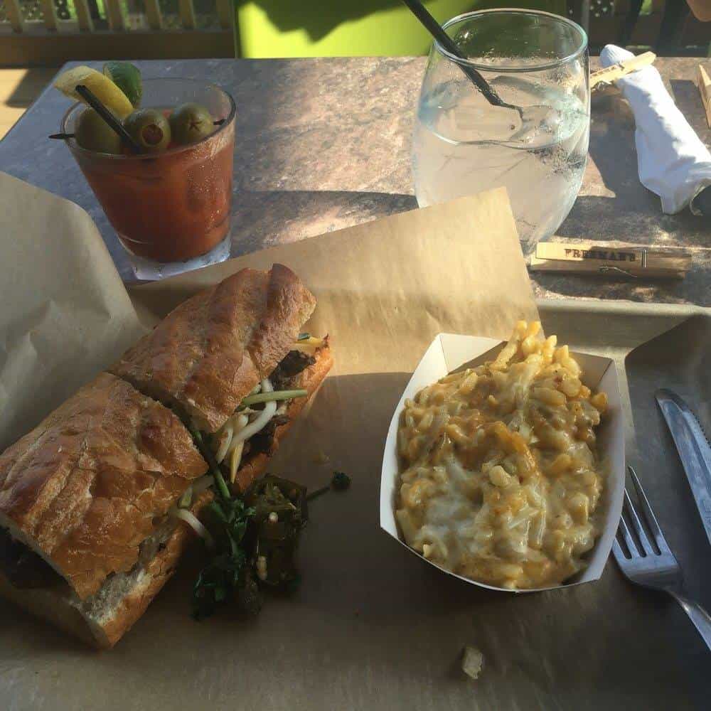 sandwich, side, and bloody mary outside
