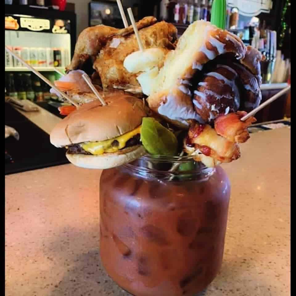 bloody mary with burger and cinnamon roll