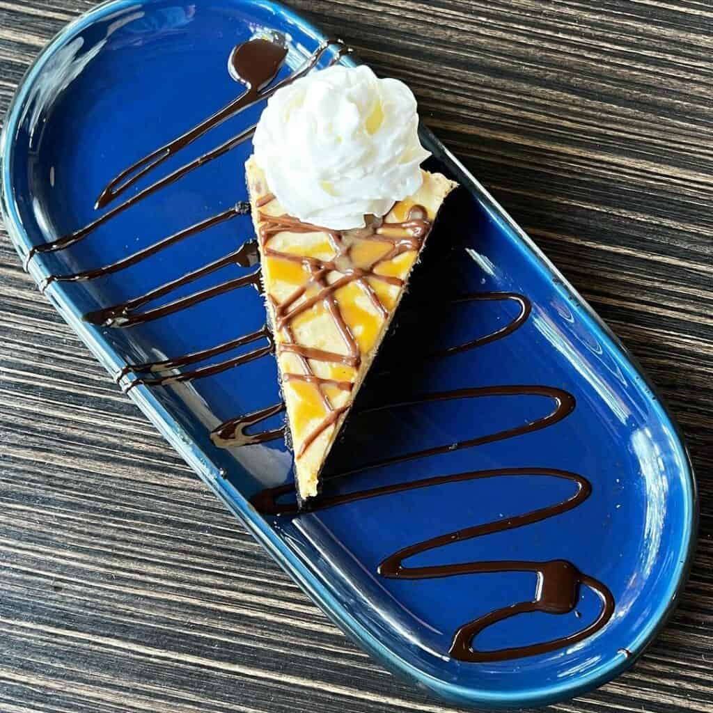 slice of pie on blue plate