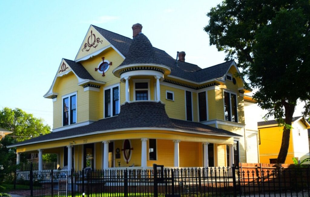 exterior of old yellow B&B
