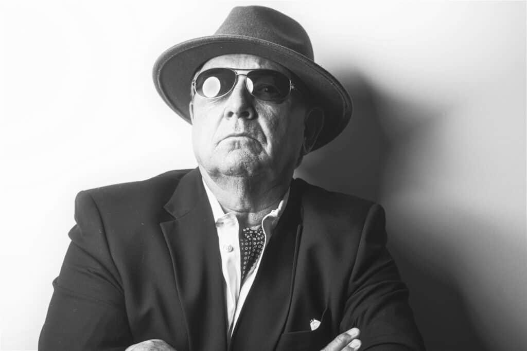 man in fedora in black-and-white
