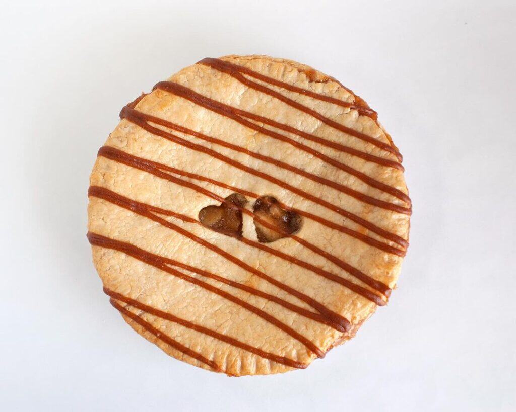 pie with hearts and caramel drizzle