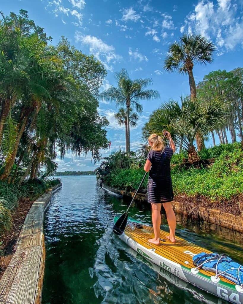 woman paddleboarding in Florida