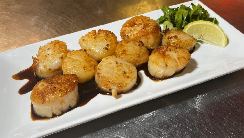 scallops on plate