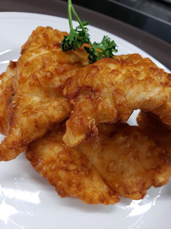 fried fish with garnish