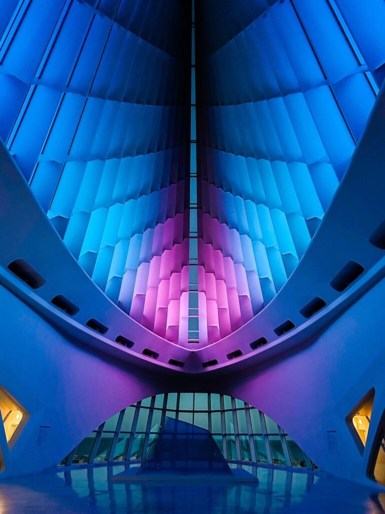 blue and pink lights inside Milwaukee Art Museum