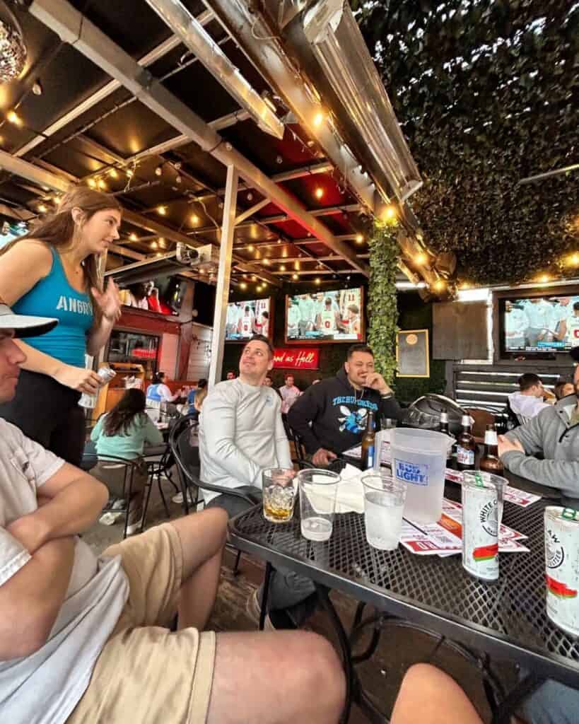 waitress taking orders on patio