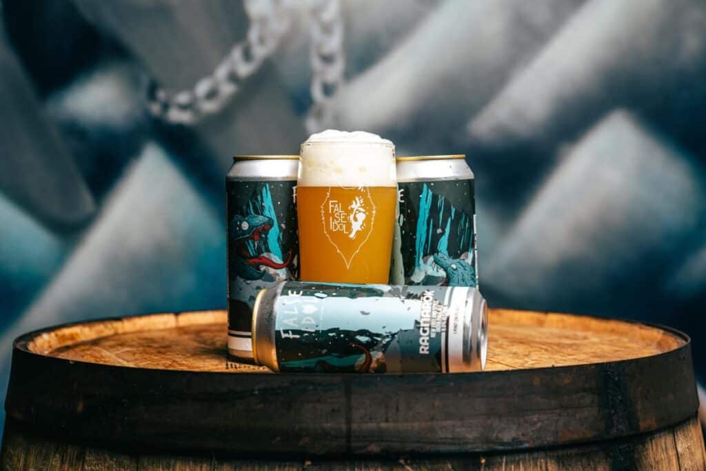 False Idol Brewing pint and cans