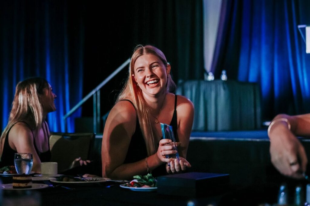 Sarah Franklin smiling with trophy