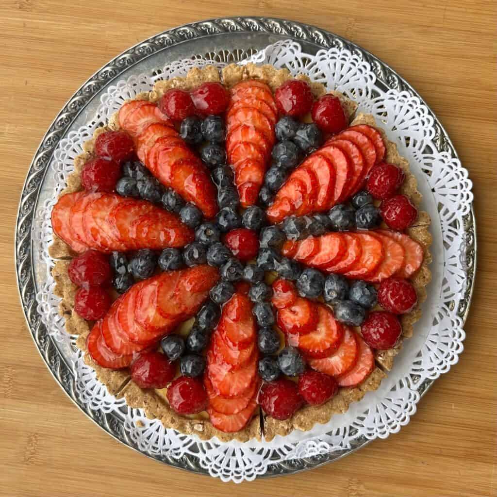 pie topped with fresh berries
