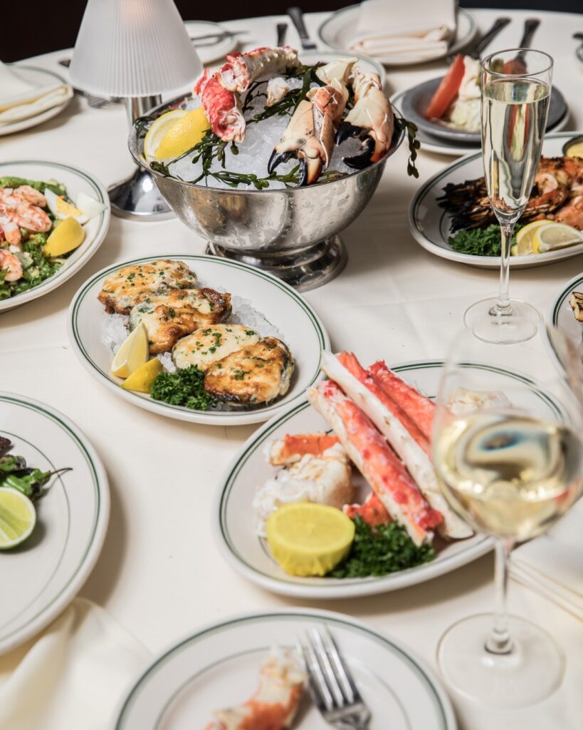 seafood dishes on table at high-end restaurant