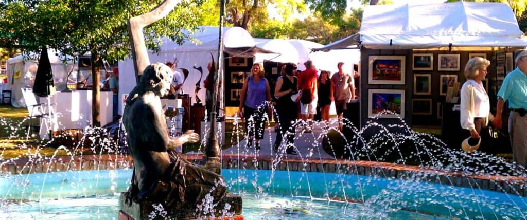 fountain and booths at Winter Park Sidewalk Art Festival