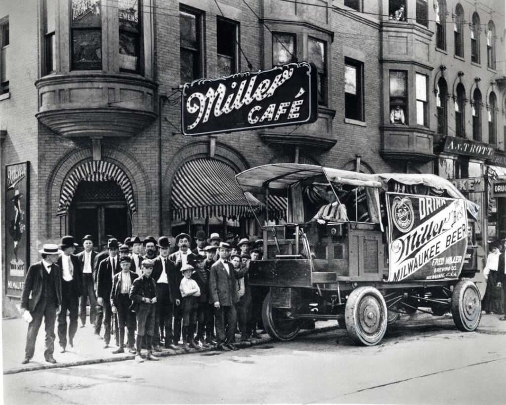 old photo of men outside The Miller Cafe